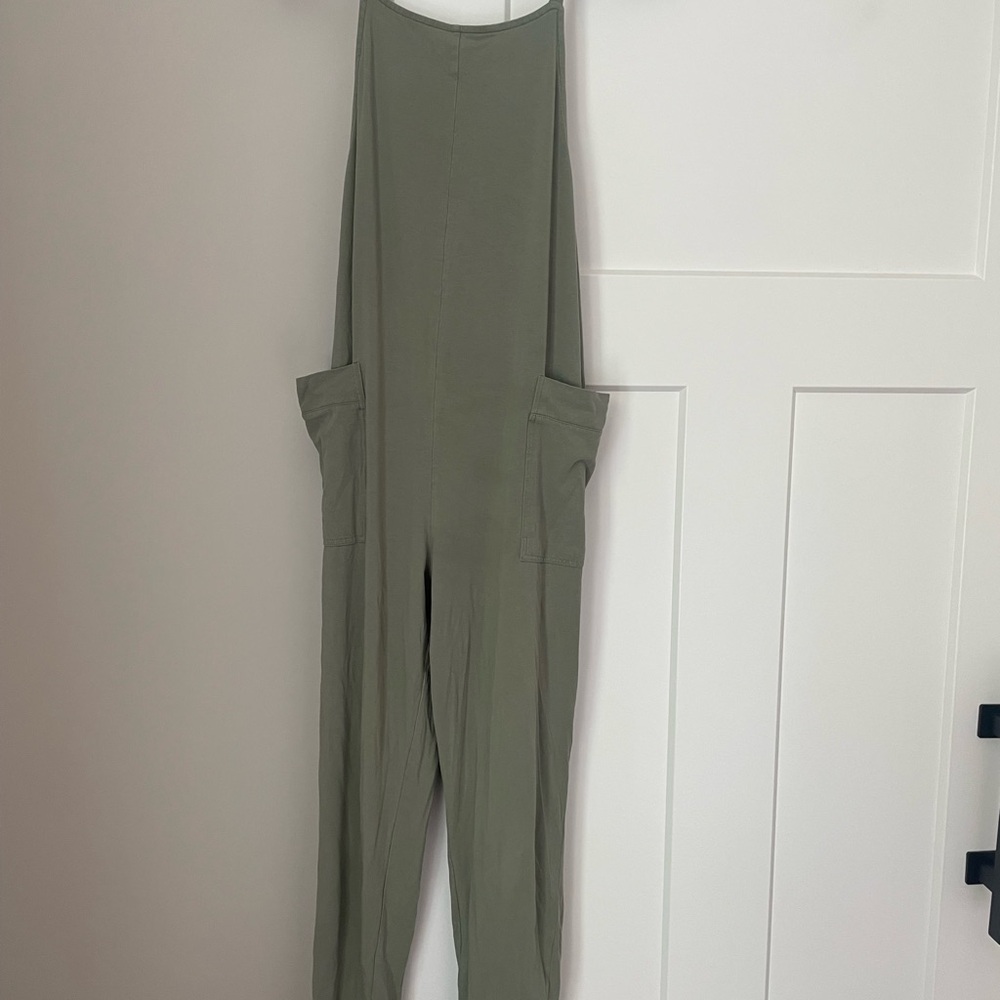 Sleek Green Jumpsuit with High Neckline and Relaxed Fit